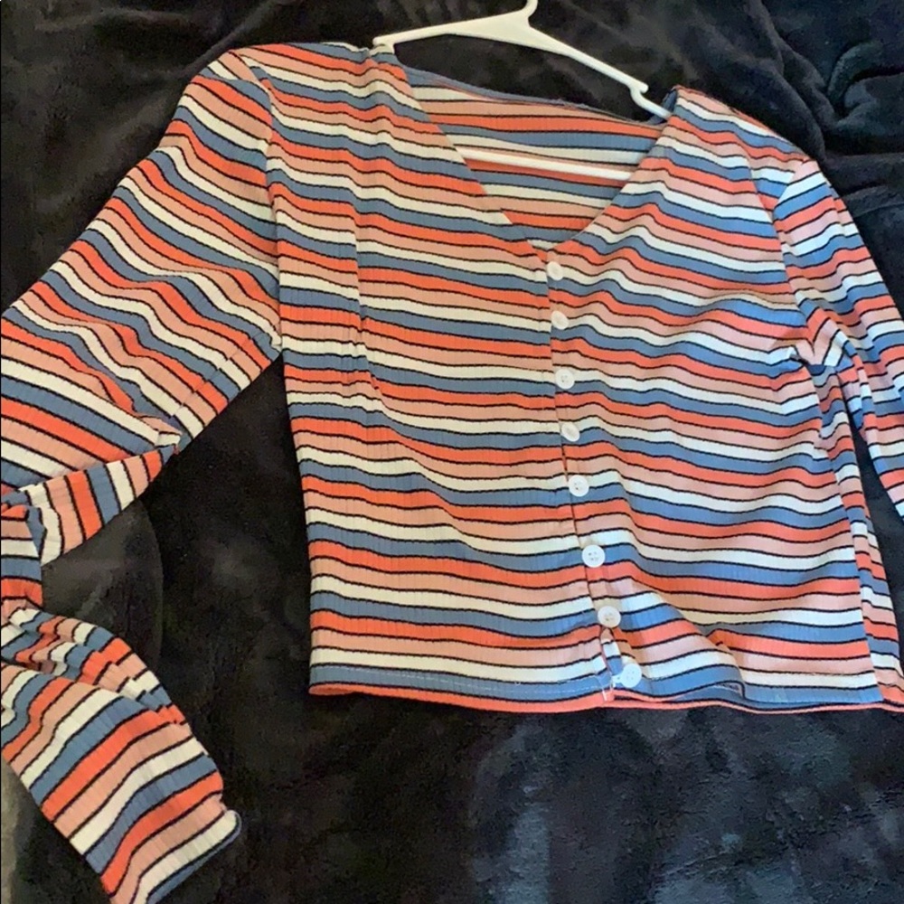 white, pink, black, and blue top